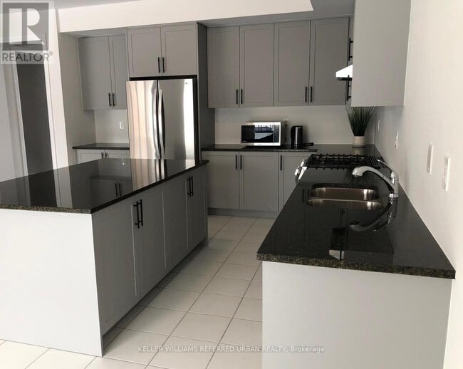 Building Photo - 1466 Stovell Cres