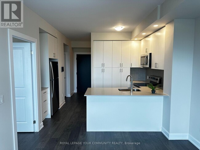 Photo du bâtiment - 3220-3220 William Coltson Ave