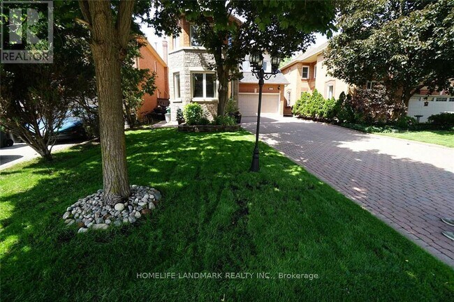 Building Photo - 4887 Natkarni Crescent