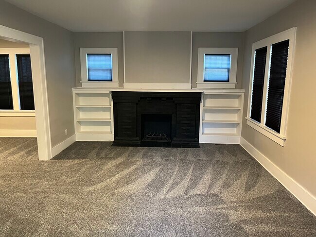 Decorative fireplace with built-in bookshelves - 737 S Hillside St