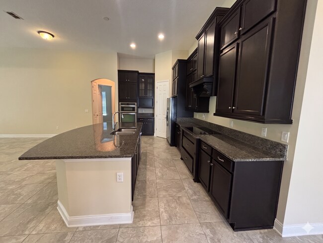 Foto del edificio - Spacious 4BR/3BA Home with 3-Car Garage, Bonus Office & Covered Patio in St Johns!