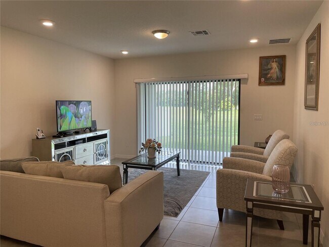 Foto del edificio - Like New Spacious Home near Lake Nona