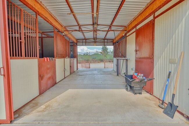Building Photo - HUGE PROPERTY W/ POOL AND HORSE FACILITY W...