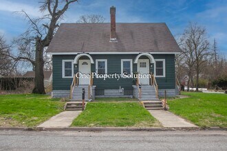 Building Photo - 1427 W 46th Ave