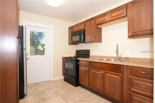 Building Photo - 5860 64th Terrace N