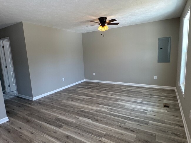 Building Photo - Charming New Home with a Rocking Chair Front Porch!