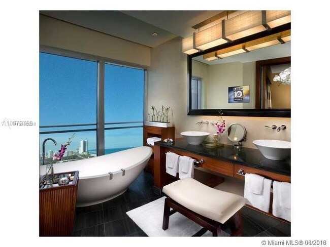 Building Photo - 10295 Collins Ave