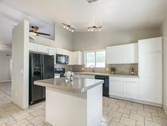 Building Photo - 16084 W Mesquite Dr
