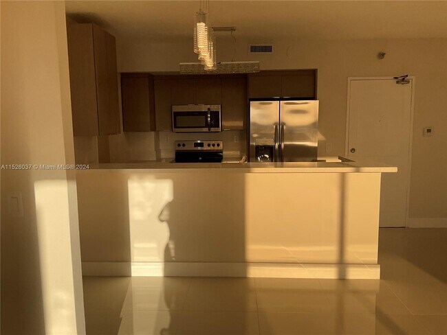 Building Photo - 10185 Collins Ave