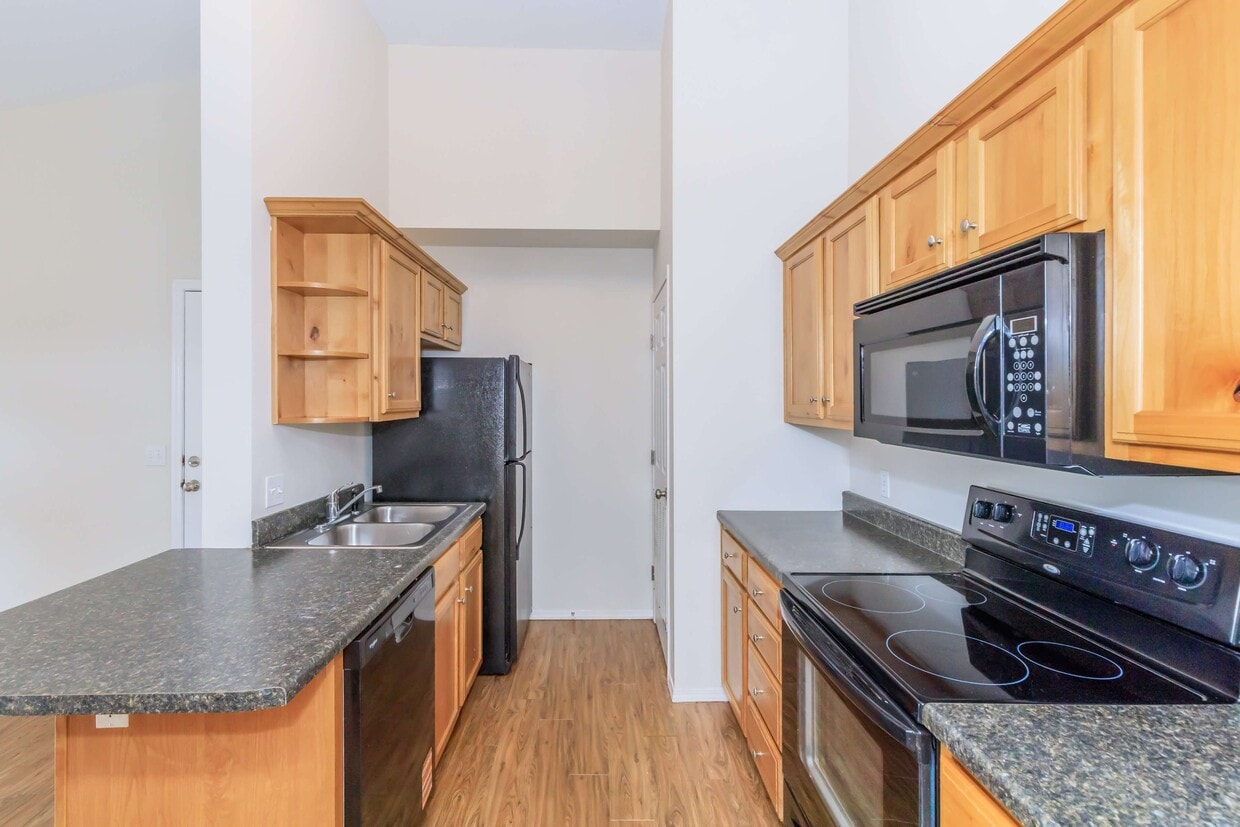 Sandstone Heights Apartments Studio Kitchen - Sandstone Heights Apartments