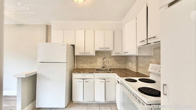 Photo du bâtiment - 6 Kings Point Dr