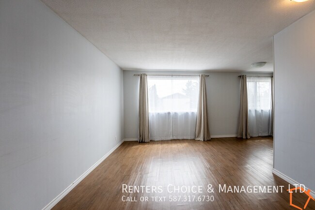 Photo du bâtiment - 2 Bedroom Main Floor, Assigned Parking, Utilities Included