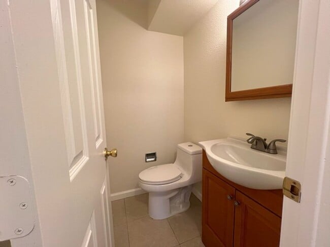 Building Photo - Three Bedroom Two and half Bathroom Tri...