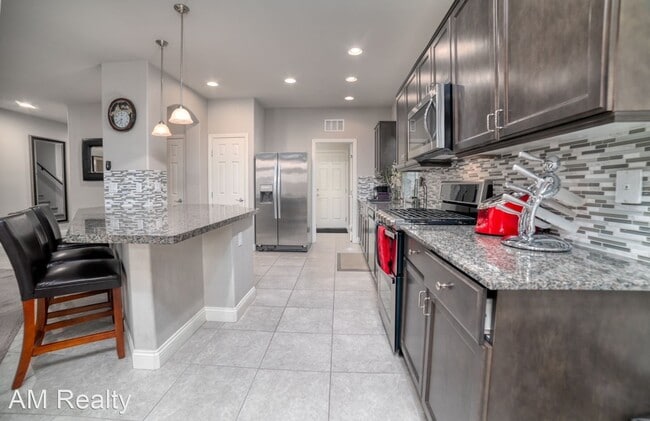 Building Photo - 4 br, 2.5 bath House - 5937 Azzura Palms Ave