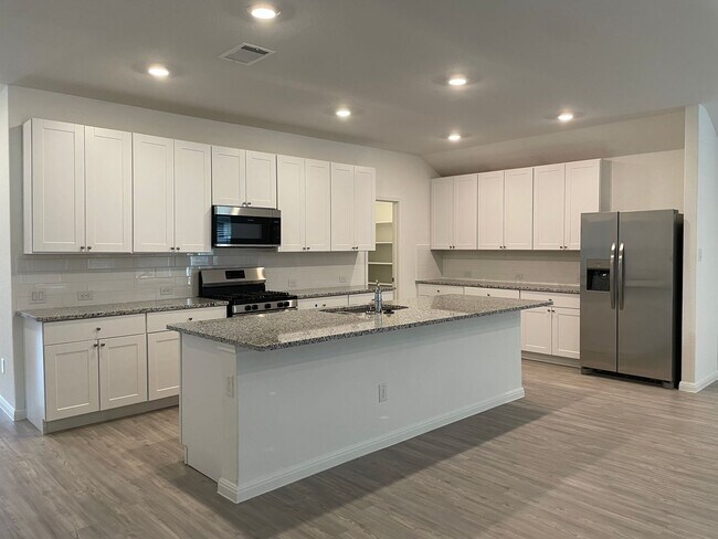 Building Photo - 3/2/2 with flex room in Heather Glen / Large Backyard / Ring Door Bell / Fridge Included /Communi...