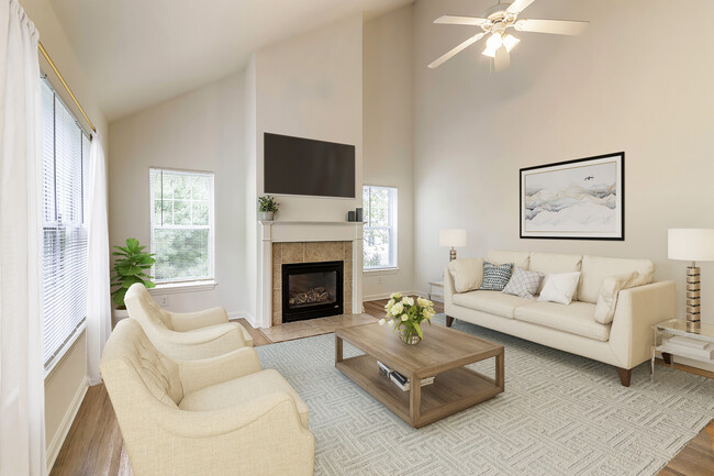 Renovated Package I living area with hard surface flooring - Avalon at The Pinehills