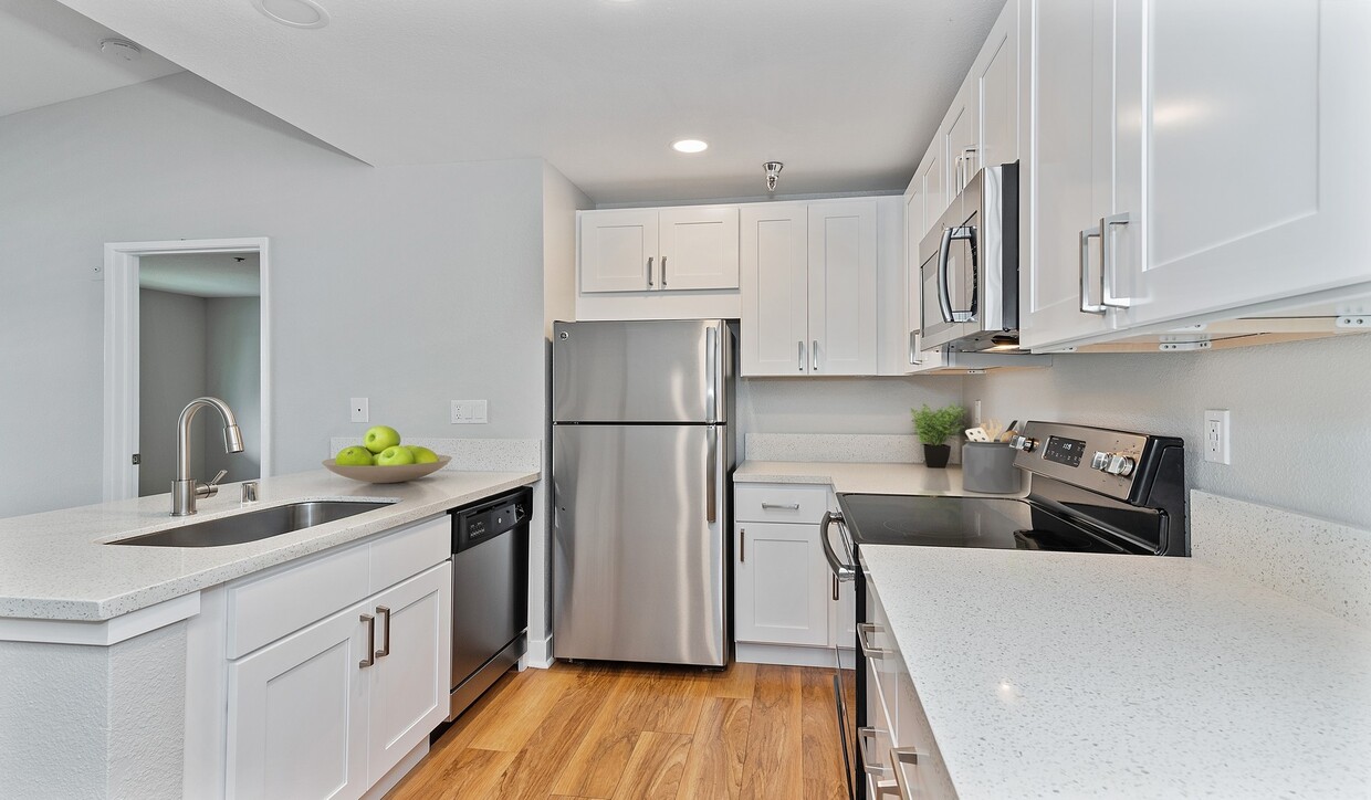 Dining room is adjacent to the kitchen - Island Club Apartments