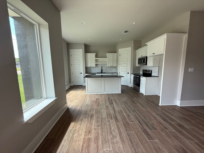 Building Photo - 3/2/1 NEW CONSTRUCTION LISD fenced yard an...