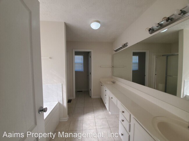 Building Photo - 4 br, 2.5 bath House - 3408 Stoneclave Place