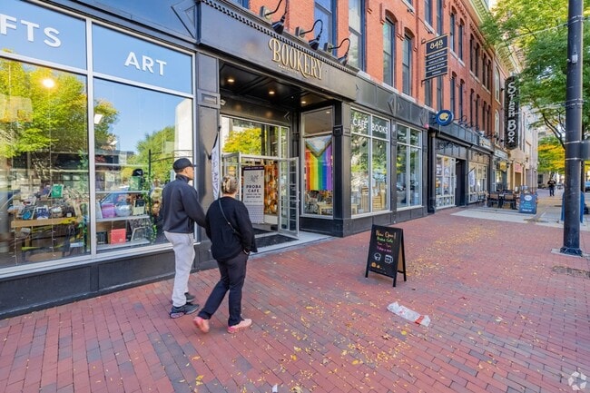 Downtown Manchester offers wide tree-lined sidewalks alongside bookstores, boutiques, and restaurants.