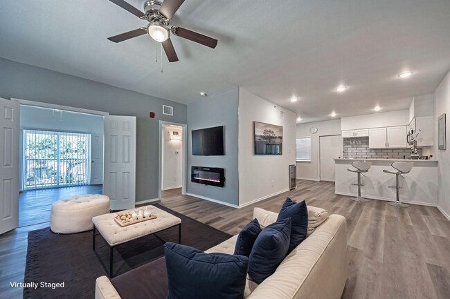 Fotografía virtualmente escenificada de una sala de estar. - 11234 Park Central Pl