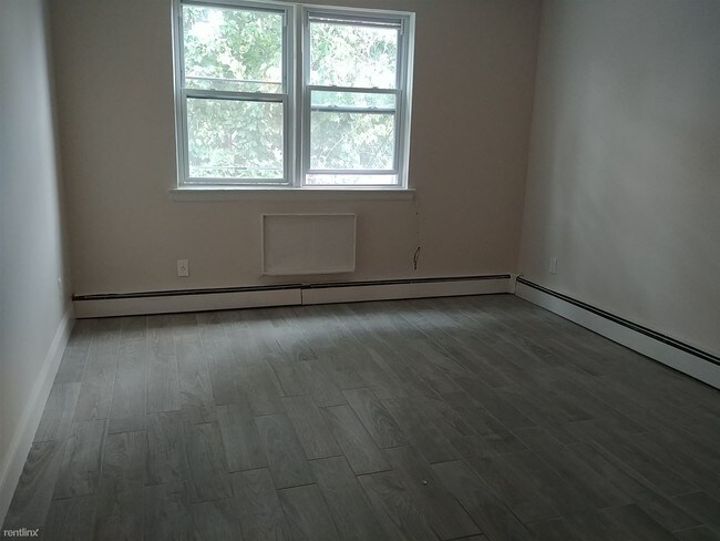 Foto del edificio - 1 br, 1 bath Apartment - 11112 Corona Ave