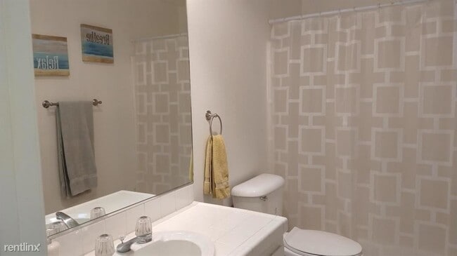 Building Photo - 3 br, 2 bath Condo - 2950 E Escoba Dr Apt L