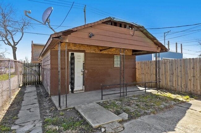 Building Photo - 1301 W 71st Pl