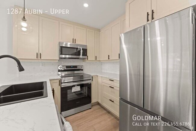 Photo du bâtiment - New Listing