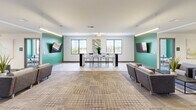 This 1970 square foot office space in Fort Myers, FL, offers a blend of functionality and modern aesthetics. The single-floor layout is efficiently divided into multiple rooms, catering to various work needs. The space features several meeting rooms with sleek wooden tables and comfortable blue chairs, ideal for collaborative sessions. Large windows in these rooms provide natural light and views of the surrounding area, creating an open and inviting atmosphere.

Individual workstations are equipped with ergonomic white chairs and granite countertops, offering comfortable and practical spaces for focused work. The office's design incorporates a pleasing color scheme of white walls accented with vibrant green feature walls, adding visual interest and energy to the environment.

A spacious common area showcases a contemporary design with a high-top bar table, stylish seating, and modern artwork, perfect for casual meetings or break times. The area is illuminated by both natural light from large windows and well-placed ceiling fixtures, ensuring a bright and welcoming space throughout the day.

The office's flooring consists of patterned carpeting, adding texture and warmth to the overall design. Thoughtful touches like plant-themed artwork and actual greenery bring a touch of nature indoors, contributing to a fresh and inspiring work environment. With its modern amenities and well-planned layout, this office space is designed to foster productivity and collaboration in a contemporary setting.