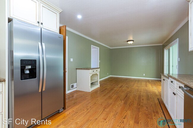Building Photo - 4 br, 3.5 bath House - 312 Harvard St.