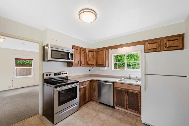Building Photo - 1203 NE 94th St. - 3 bedrooms