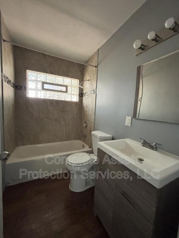 Foto del edificio - 910 W 56th Ave