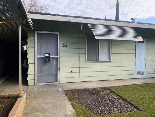 Building Photo - Cozy Studio With Designated Carport!