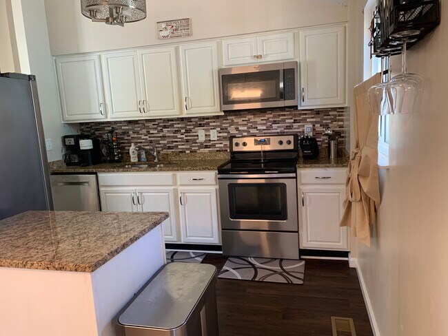 Kitchen with brand new dishwasher - 7777 Kidwell Dr