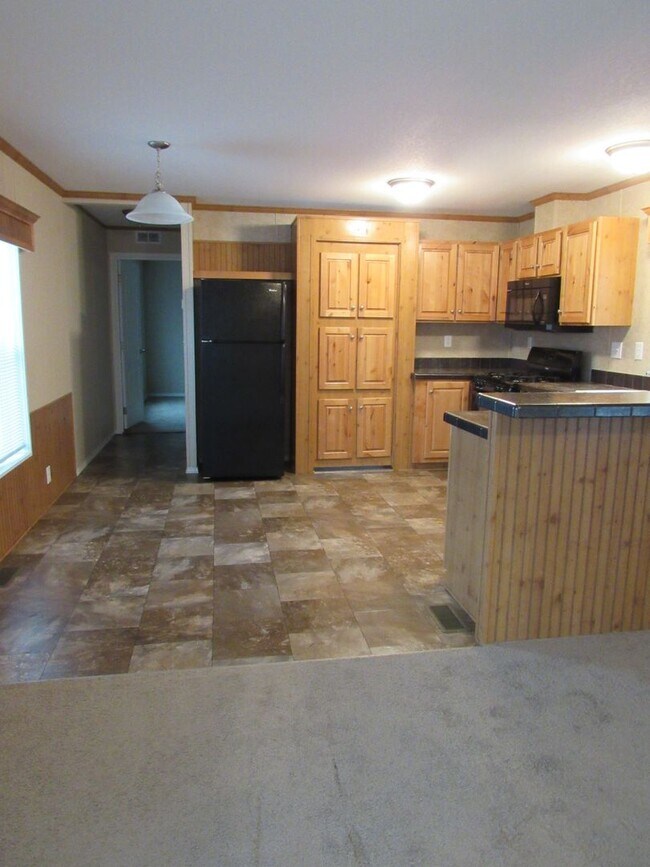 Foto del edificio - 3 Bed 2 bath Mills Mobile Home on Beautiful Treed Lot