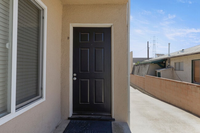 Front door to unit D - 2516 Voorhees Ave