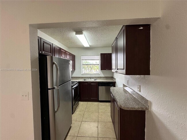 Building Photo - 400 NW 65th Ave