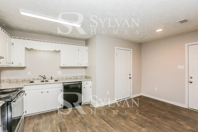 Foto del edificio - This adorable home is ready for your personal touch!