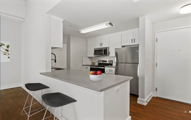 Renovated kitchens with premium finishes are available for upgrade. Ask the leasing team for more details. - The Left Bank Apartments