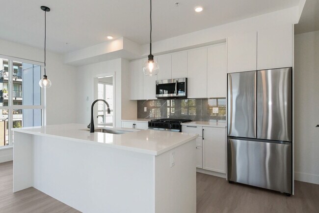 Building Photo - Available Now! Brand New Corner Unit w/Air...