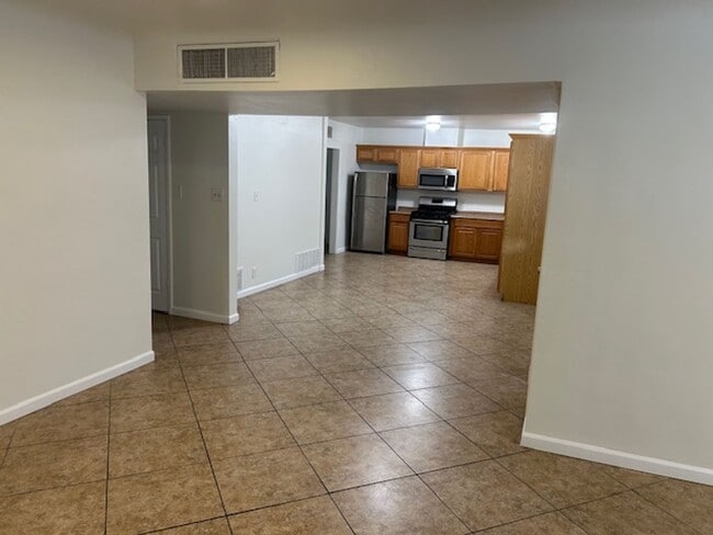 Building Photo - All Utilities Included! Spacious 3 Bedroom + Den Near Phoenix Country Club