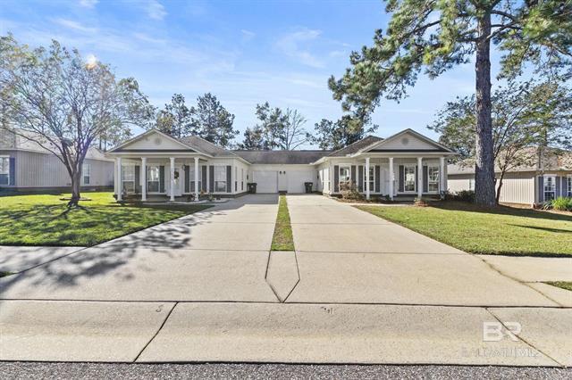 Street view - unit on the right with a one car attached garage - 33156B Stables Dr