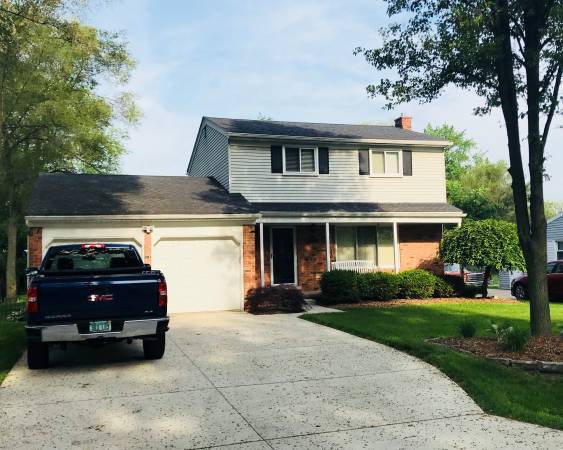 Front, 2 car attached garage w/ room for plenty of storage &amp; refrigerator! - 8827 CORINNE ST