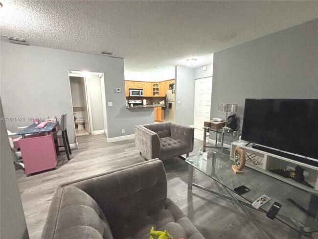 Foto del edificio - 3859 Coral Tree Cir