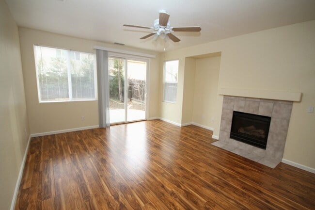 Building Photo - 4 Bed| 2.5 Bath | 2061 SF | 2 Car Garage | Long driveway with gate | Tenant pays $175 monthly for...