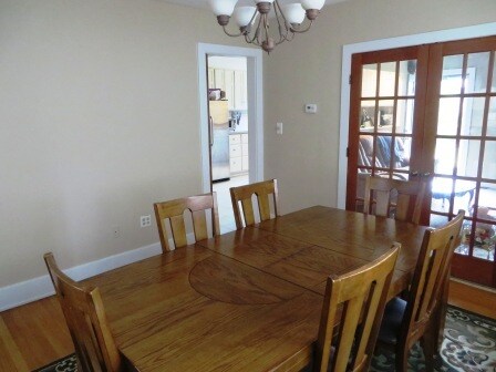 Formal dining room--French doors lead to family room - 100 Oak Knoll Dr