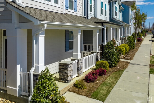 New traditional homes with front porches in Pineville, NC.