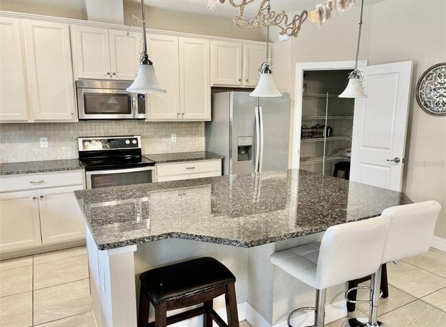 Building Photo - 7112 Enchanted Lake Dr