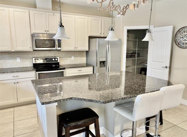 Foto del edificio - 7112 Enchanted Lake Dr